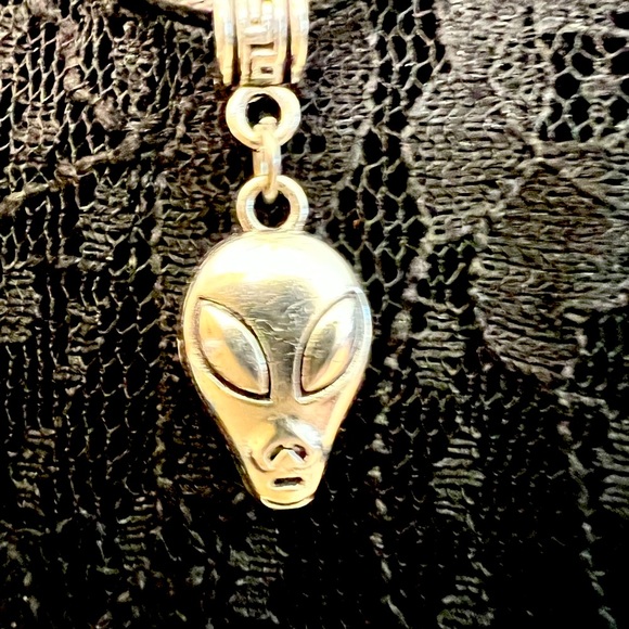 Planetary Visitor Alien Head Necklace on a Black Cord with Saturn Charm ending - Picture 4 of 10